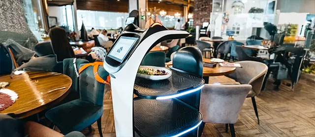 How AI and IoT Are Enhancing Robot Functionality in Hotels?